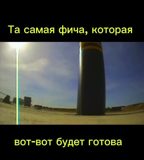 a rocket on a launchpad with a streetlight