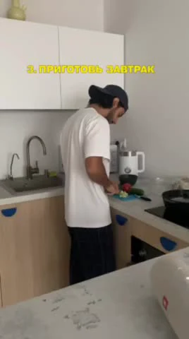 Man in kitchen preparing breakfast