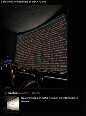 a large movie screen in a cinema with code on it