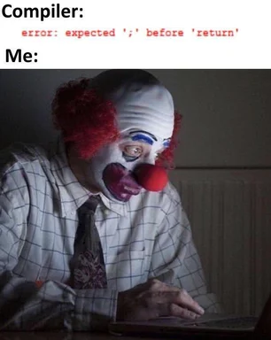 Clown with shocked expression looking at laptop