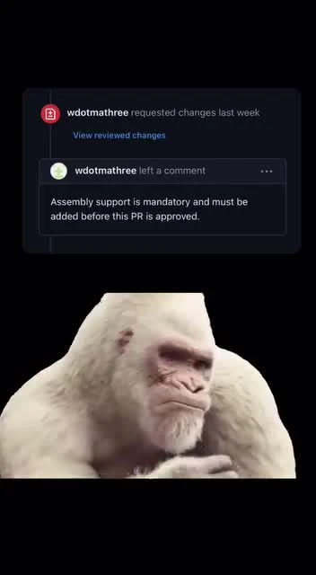 Disapproving white gorilla meme with GitHub comment about mandatory assembly support for PR approval