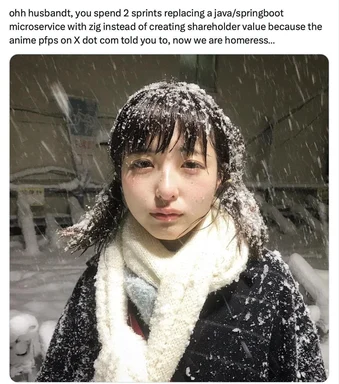 snowy woman with dark hair and white scarf looking sad