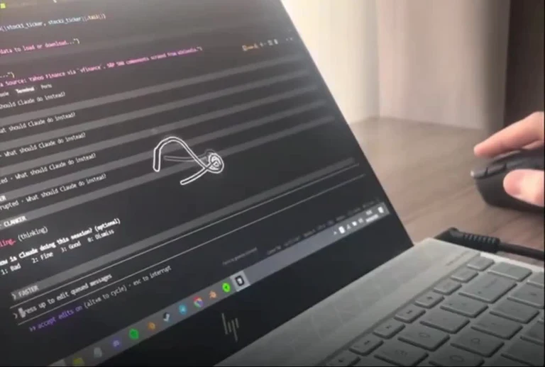 Laptop screen showing an AI coding tool stuck in a loop with the text 'What should Claude do instead?'