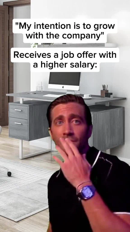 Man in office with shocked expression and hand on mouth, with text overlay about job offer