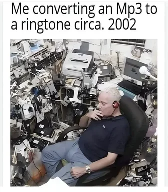 man sitting in chair surrounded by old electronics, converting mp3 to ringtone