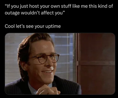 Smiling man in a suit looking smug with text about hosting and uptime