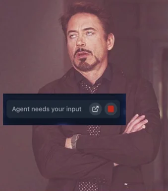 Robert Downey Jr. with arms crossed and a confused expression, with a pop-up window saying 'Agent needs your input'