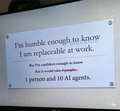 A printed office sign reading 'I'm humble enough to know I am replaceable at work. But I'm confident enough to know that it