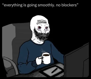 Cartoon man sitting at a computer with a coffee cup, looking concerned with the caption 'everything is going smoothly. no blockers'