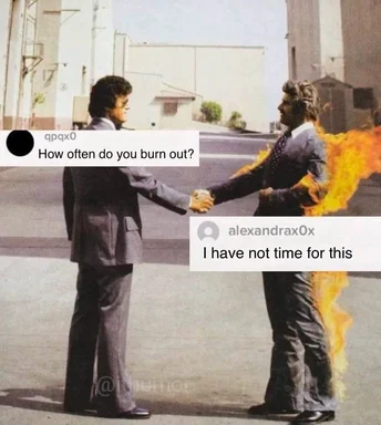 Two businesspeople shaking hands, one on fire