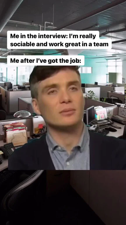 Man looking unimpressed in an office setting with text about being sociable in an interview vs reality