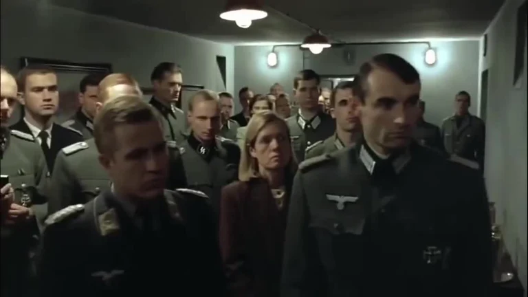 A group of military officers in a hallway looking confused and serious, used as a reaction meme template.
