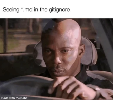 bald man looking surprised at steering wheel with text 'Seeing *.md in the gitignore'