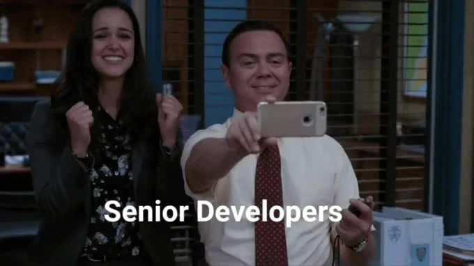 Senior developers celebrating with a selfie