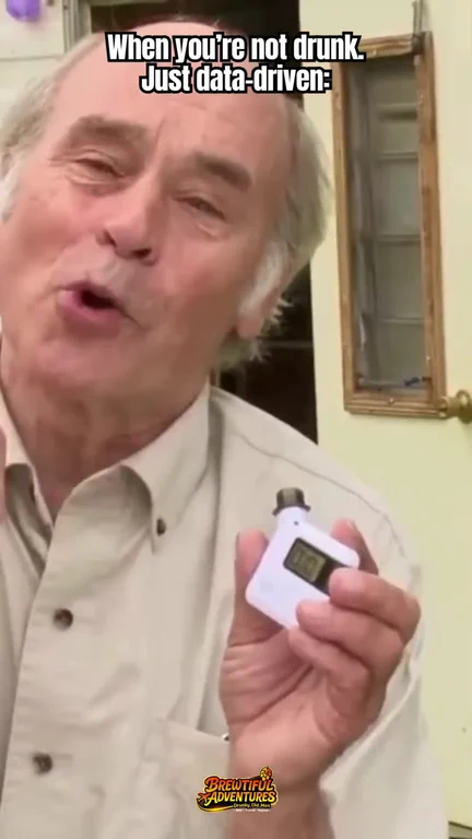 Senior dev holding a breathalyzer with a caption about being data-driven