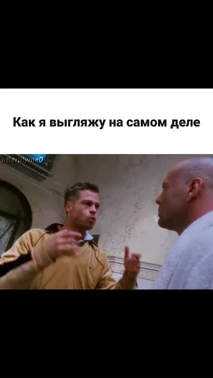 Two men talking, one gesturing