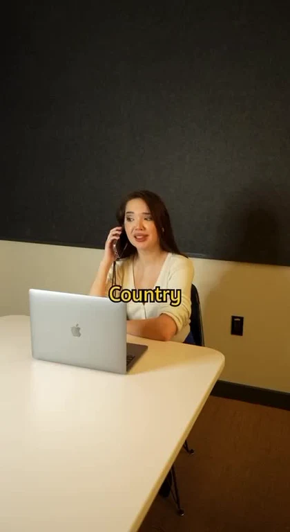 Woman on phone with laptop, labeled 'Country'