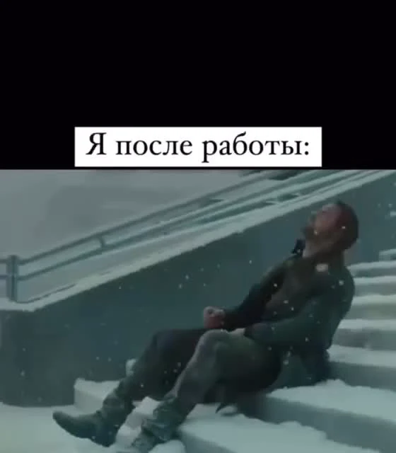 Man sitting on snowy stairs, looking up, with Russian text overlay