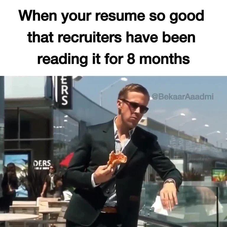 man in suit eating pizza with caption about resume