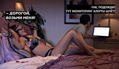 Man on bed with laptop ignores woman
