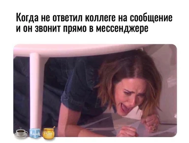 Woman hiding under table with a fearful expression