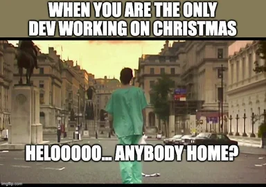 a man in green scrubs standing alone in a city street with the text 'when you are the only dev working on christmas helooooo... anybody home?'