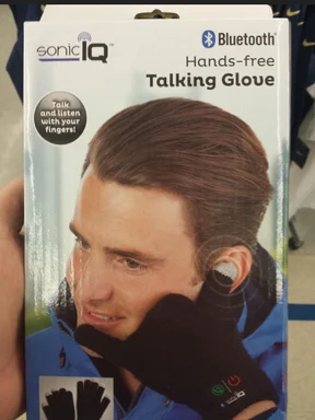 A box for the SonicIQ Bluetooth Talking Glove showing a man holding a black glove to his ear to talk