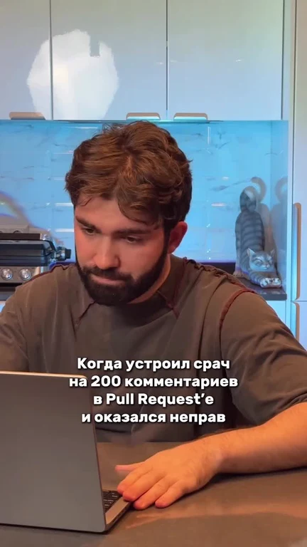 Man sitting at a laptop with a regretful expression