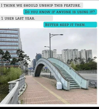 a city bridge with a staircase and a sidewalk, with a humorous exchange about keeping a feature based on a single user