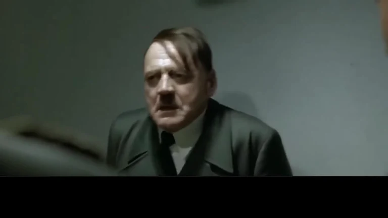 Close-up GIF of Adolf Hitler looking confused and staring intensely.
