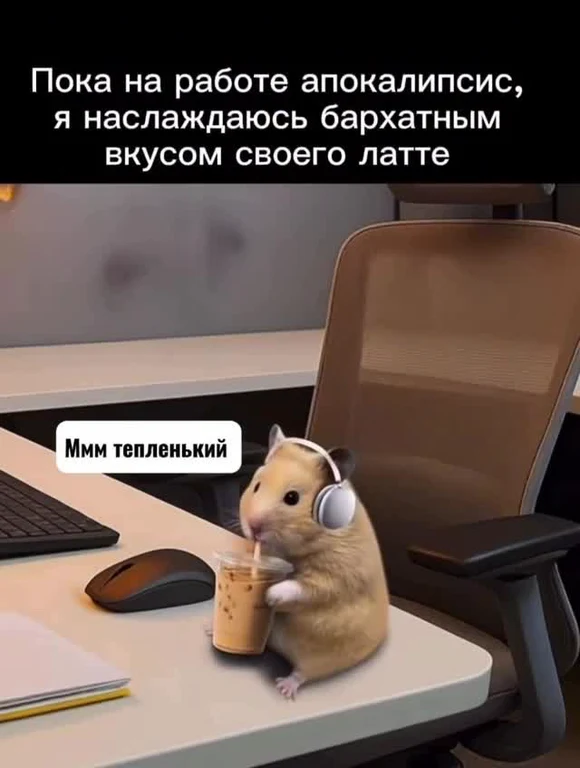 hamster in headphones drinking latte at office desk