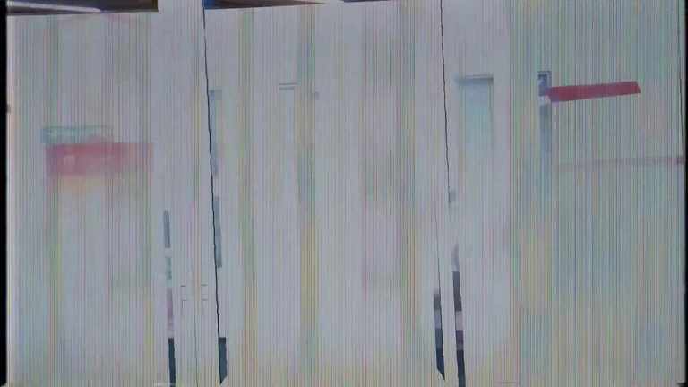 Glitchy computer screen with distorted vertical lines and a red error bar