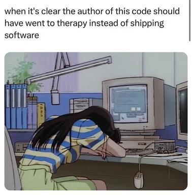 Cartoon woman with head on desk in front of computer