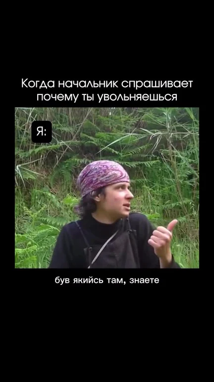 Man in a bandana talking in a field