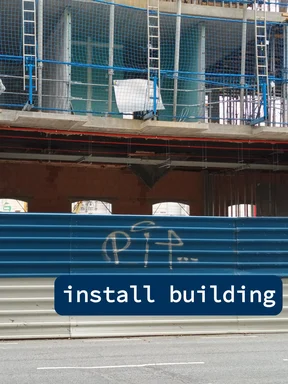 Photo of a construction site with scaffolding and a blue fence, overlaid with a blue banner reading 'install building'.