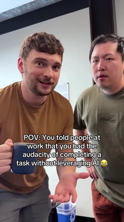 Two men looking surprised and amused, one holding a coffee mug