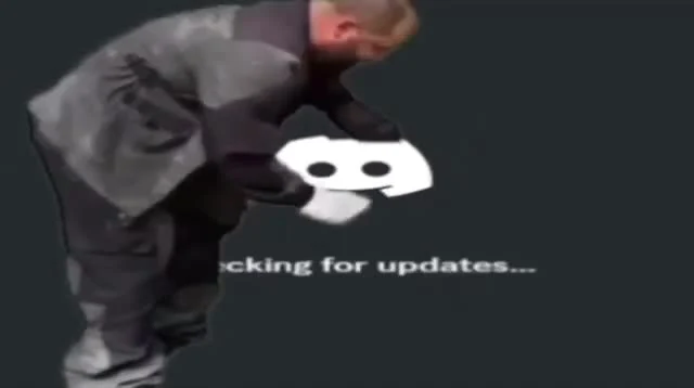 Man looking at Discord logo with 'checking for updates' text