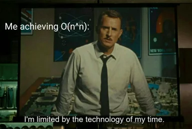 a still from a movie of a man in a white shirt and black tie standing in front of a table with a confused expression on his face