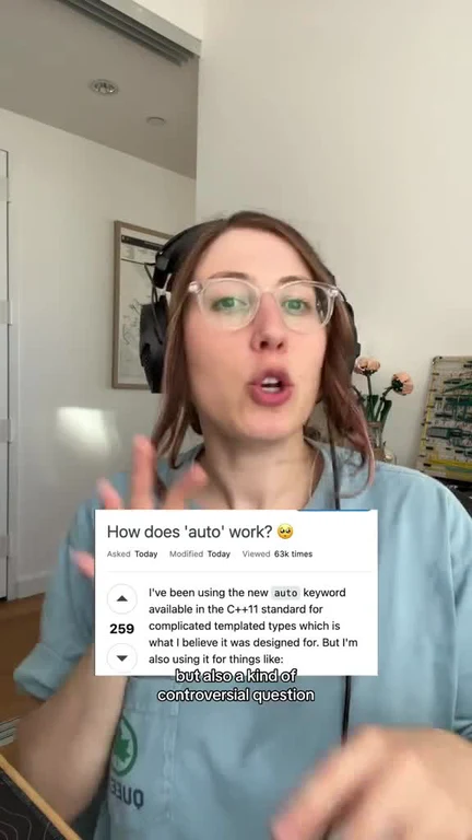 a woman with glasses and headphones on, reacting to a Stack Overflow question about C++11's 'auto' keyword