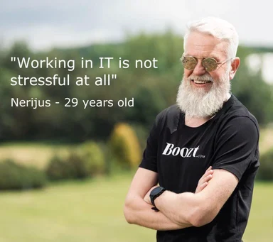 Smiling older man with white hair and beard wearing black t-shirt with text overlay