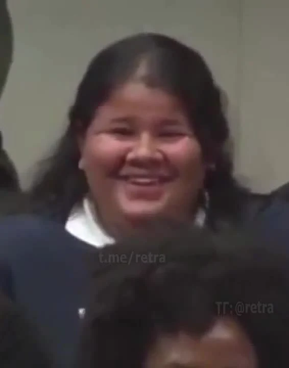 Woman laughing with a reaction