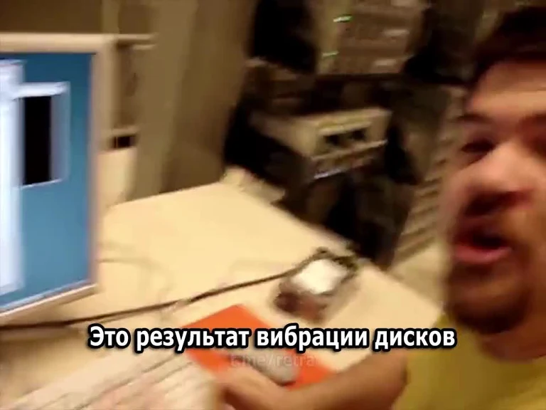 Man reacting in shock at a computer screen