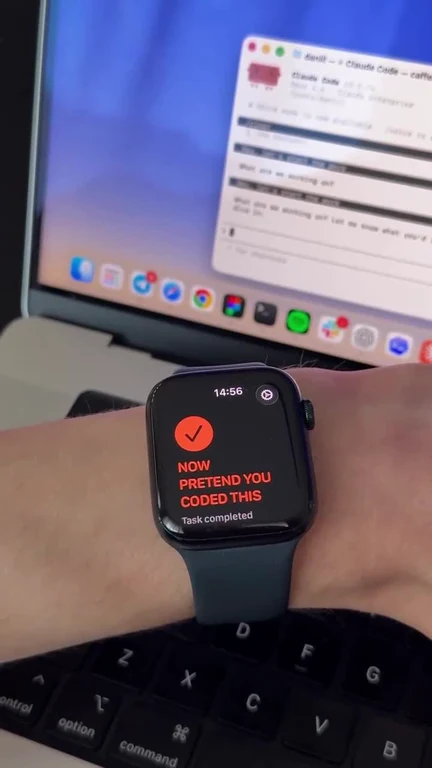 Smartwatch with a notification that says 'NOW PRETEND YOU CODED THIS'