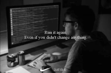 programmer working on computer with code on screen and Nike logo