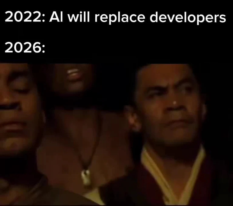 Meme showing a skeptical face with text '2022: AI will replace developers' and '2026:' implying the prediction hasn't come true yet.