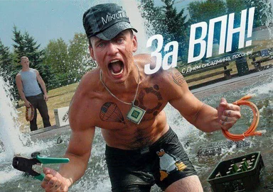 Man in a cap and penguin shorts holding pliers and an orange cord, with a shocked expression, in front of a water background with another man.