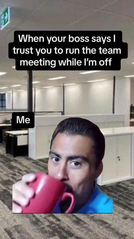Man with a shocked expression holding a coffee mug, representing a worker's reaction to being trusted to run a team meeting