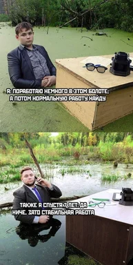 man in suit sitting in swamp with desk and chair