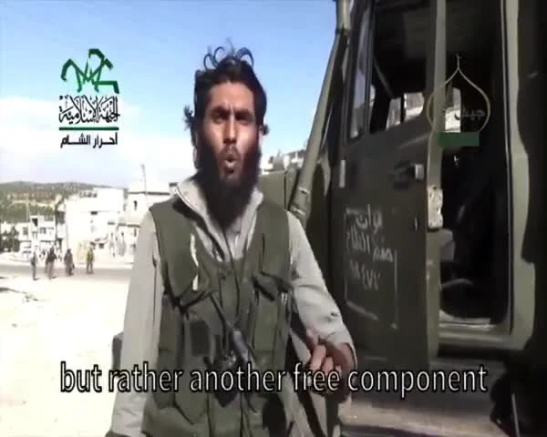 A man in a tactical vest standing by a truck with the caption 'but rather another free component'.
