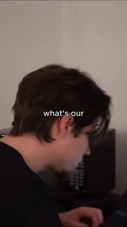 a man looking at a computer screen with a questioning expression